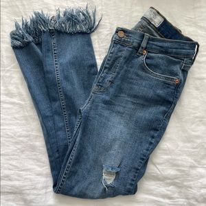 Free People medium wash distressed hem jeans